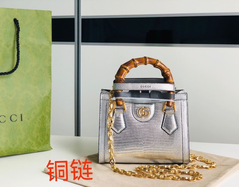 G*u*i top handle bags